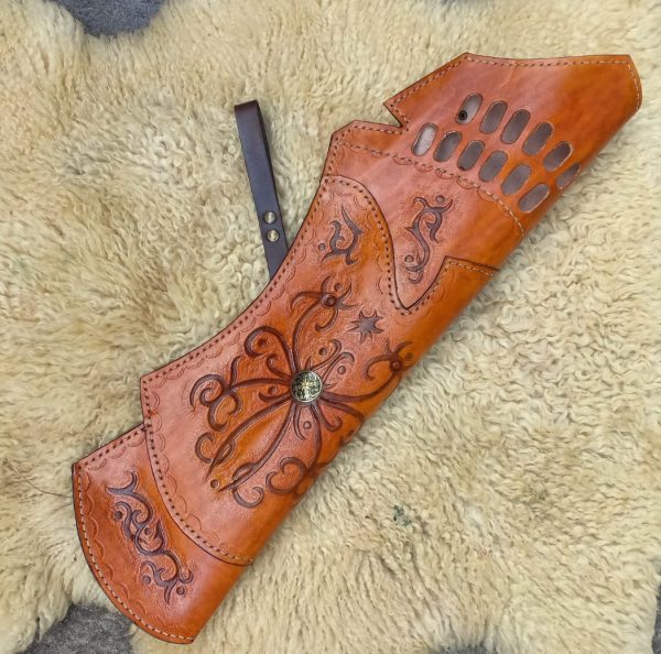 Traditional Hand-Crafted Leather Quiver, resting on fur.